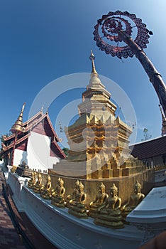 Panya Tharonusorn Pagoda or golden pagoda at Wat Pa Pathomchai in Thailand.