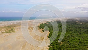 Paoay Sand Dunes, Ilocos Norte, Philippines. Sand hills and trees.