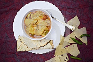 Papad ki sabji a north western indian cuisine food dish from rajasthani and gujarati state in india. Traditional side dish curry