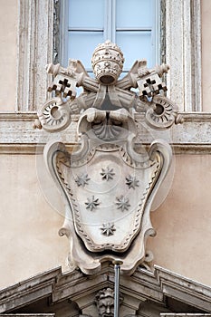 Papal coat of arms, facade of the Church of the Gesu in Rome