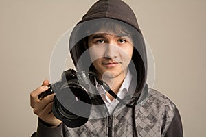 Paparazzi man taking picture with photo DSLR digital camera