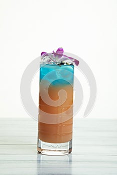 Papaya and blue curaÃÂ§ao liquer cocktail