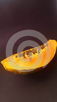 Papaya close-up on a black background