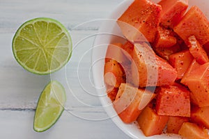 Papaya fruit with chili, mexican snack, spicy food in mexico photo