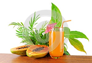 Papaya fruit and glass of juice
