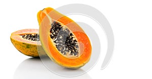 Papaya fruit isolated on white background. Halved fresh organic Papaya exotic fruits close up