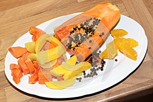 Papaya, mango and orange slices