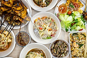 Papaya salad, grilled chicken and Sai krok isan Thai food