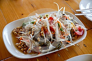 Papaya salad with horse crab or blue crab (Thai food),