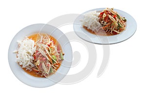 Papaya salad popularly eaten with noodles. isolated on white background with clipping path.