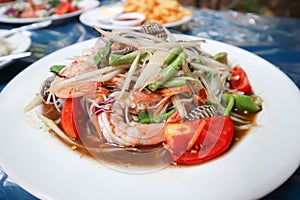 Papaya salad, som tam or spicy shrimp and shell salad
