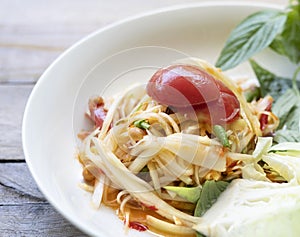 Papaya salad,Thai cuisine , isolated on white background with cl