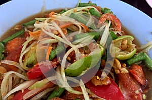 Papaya salad Thai cuisine spicy delicious.Thai food, papaya salad, Somtum, Closeup