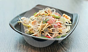 Papaya salad thai traditional food or name in thai Somtum photo