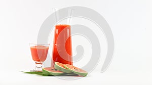 Papaya smoothie in glass jar and glasses on white background