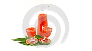 Papaya smoothie in glass jar and glasses on white background