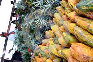 Papayas and Pineapples in Market