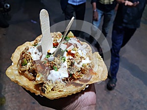 Papdi chaat indian spice hand held salty and sweet
