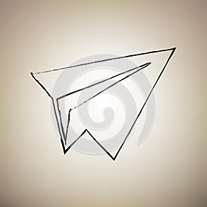 Paper airplane sign. Vector. Brush drawed black icon at light br