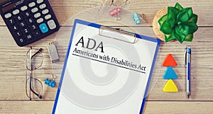 Paper with Americans with Disabilities Act ADA on the table