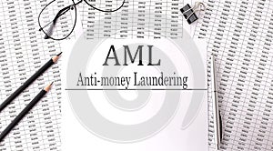 Paper with Anti-money laundering AML on chart