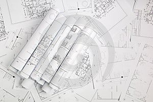 Paper architectural drawings and blueprint. photo