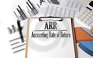 Paper with ARR ACCOUNTING RATE OF RETURN on a chart background