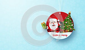 Paper art of Christmas circle tag banner and hanging rope on blue snowflake background