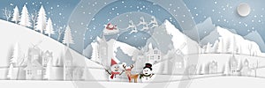 Paper art, Craft style of Countryside Landscape Santa Claus and snowman in village with snow mountain