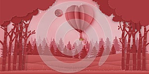 Paper art , cut and digital craft style of the Lover with heart hot air balloons in winter season and snow on pink nature