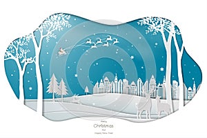 Paper art design with Santa Clause coming to town on blue background