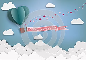 Paper art of love and Origami made air balloon heart shape flying with valentines day label.