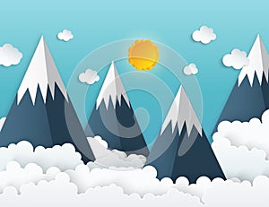 Paper art origami mountains with snow, white fluffy clouds