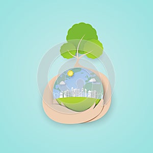 Paper art of save the world concept with tree and eco green city background