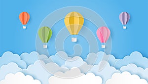 Paper art style of colorful hot air balloons and cloud on blue sky. Vector illustration
