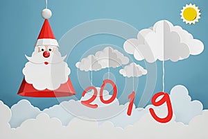Paper art style of Santa Claus hat and 2019 hang with cloud in the blue sky