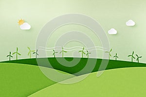 Paper art of Sustainability of alternative energy and ecology conservation concept.Wind turbine on green nature mountains
