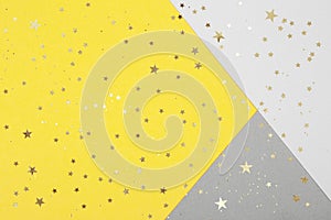 Paper background in two trendy colors of year 2021 - yellow and gray