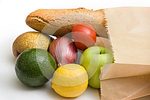 Paper bag with bread, fruits and vegetables