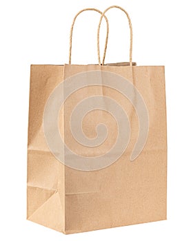 Paper bag. Kraft paper shopping bag. Brown folded paper bag with handle. Empty grocery paper bag