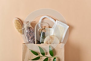 A paper bag with spa items. Eco products for body care. Eco packaging. Zero waste. Flat layout, top view, place to copy