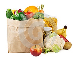 Paper bag with various food - fresh vegetables, fruits and bread