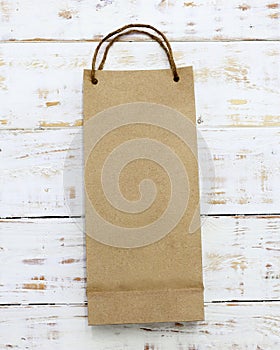 Paper bag on a wooden texture