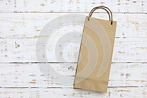 Paper bag on a wooden texture