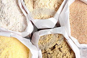 Paper bags with different types of flour