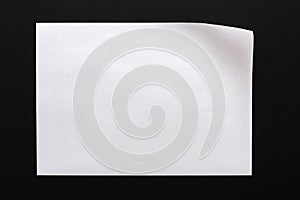 Paper with bent corner, black background