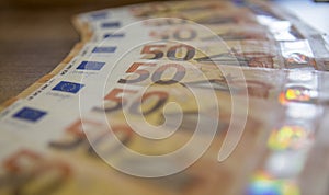 paper bills of the European currency euro laid out beautifully on the table