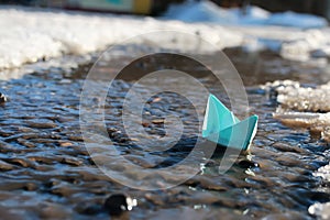 Paper boat in a pool