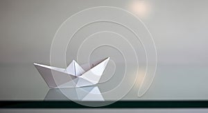 Paper Boat on Reflective Surface