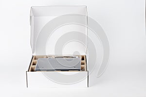 Paper box, inside wifi router, wireless device with three antennas on white background